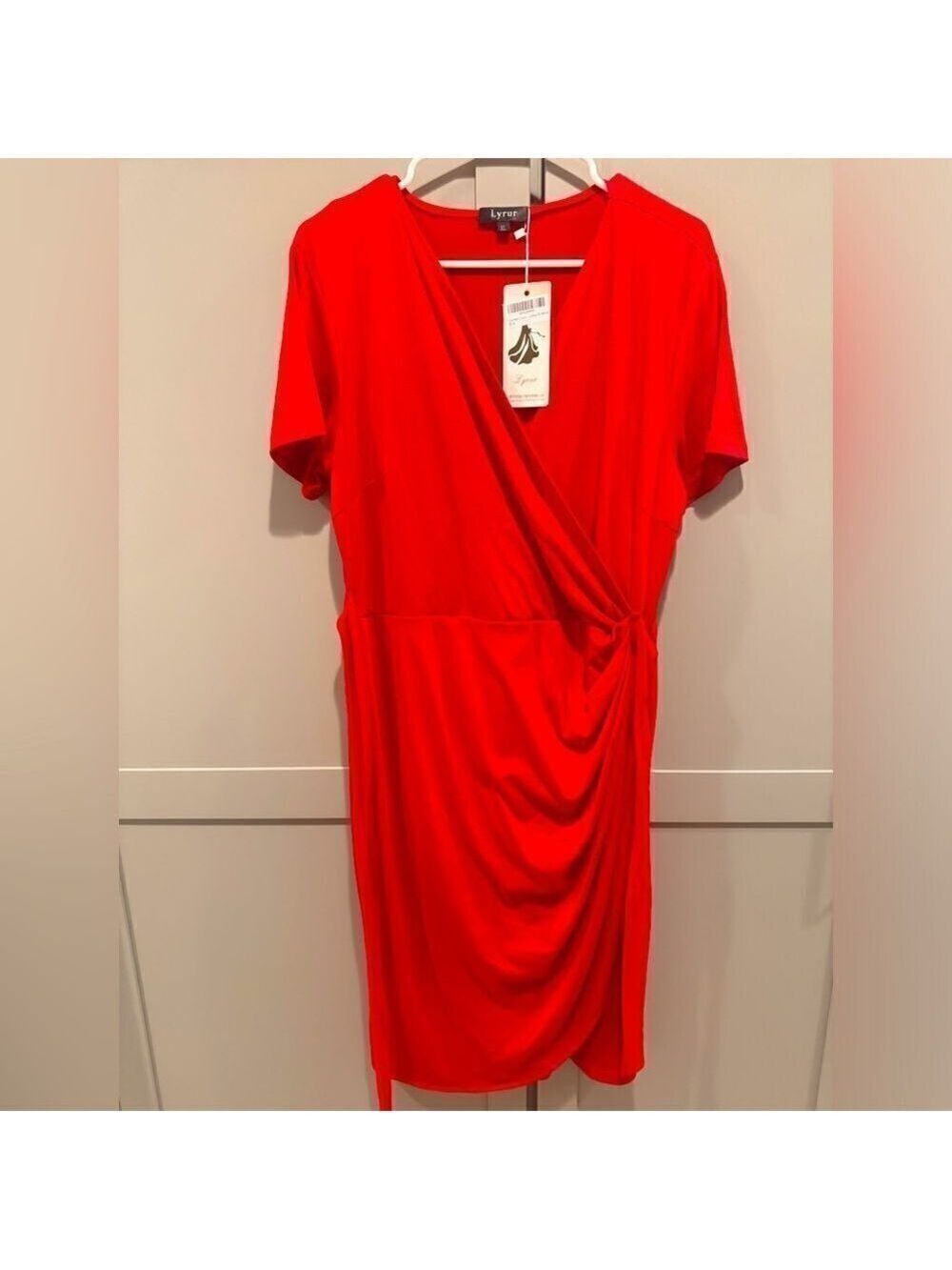 Very flattering red faux wrap red dress! Size xl